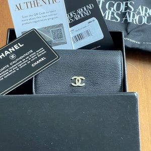 Authentic Chanel black double-sided wallet.